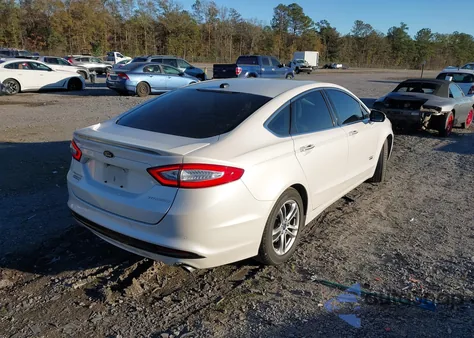 2016 Ford Fusion Energi Titanium from USA, damaged, VIN 3FA6P0SU3GR311816